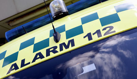 MC k�rt ind i holdende bil