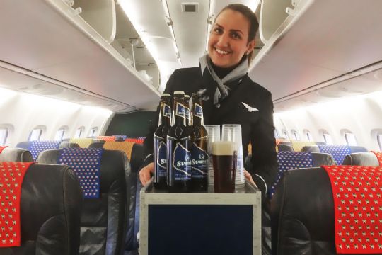 DAT sk�nker jule�l p� indenrigsfly