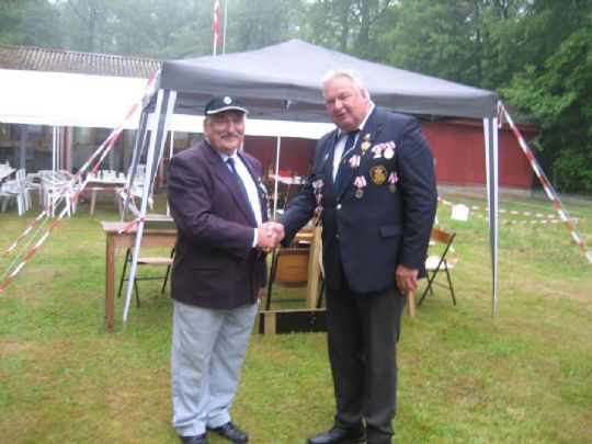 Fuglekonge og fortjenstmedalje