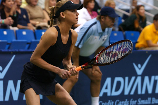 Tennis kostede travbanen oms�tning