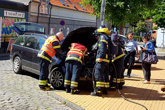 R�gudvikling fra parkeret bil