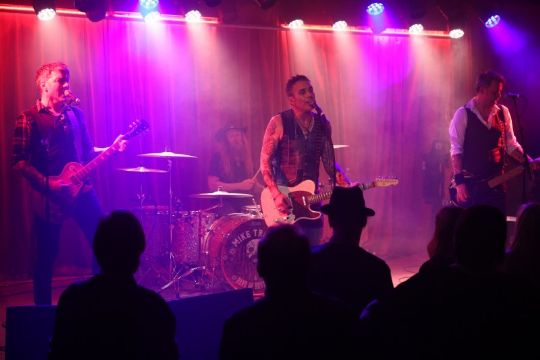 Mike Tramp med band i Musikhuzet