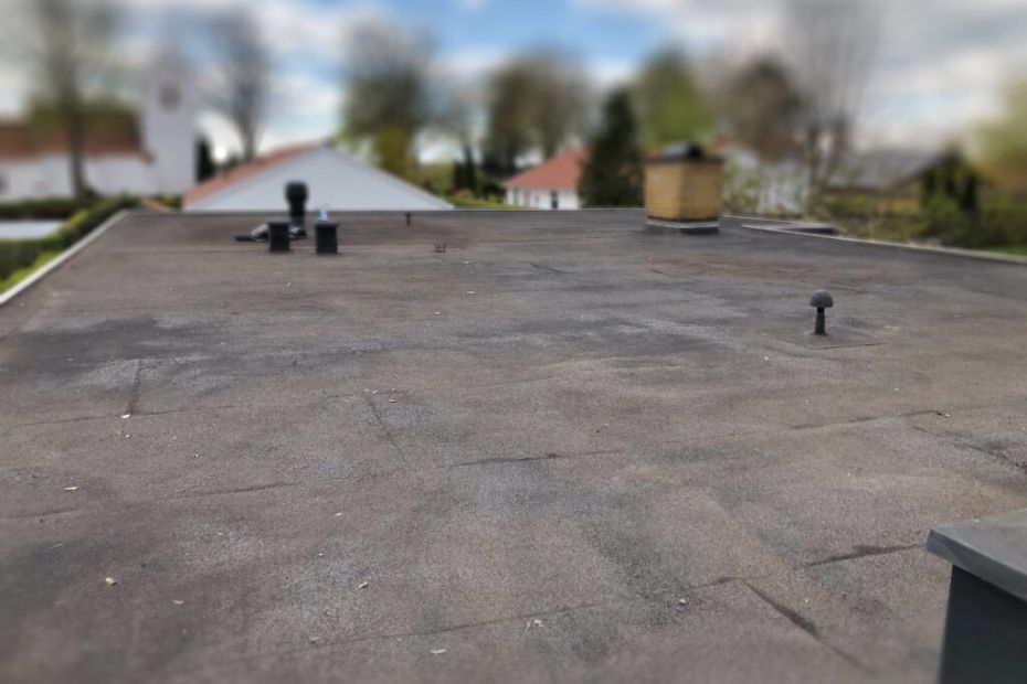 Tjek det flade tag i god tid