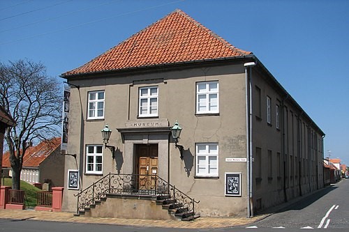 Afs�tter millioner til museum og arkiv